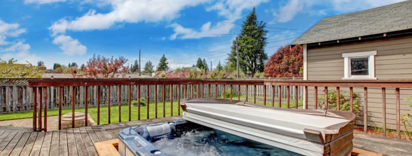 Backyard deck with hot tub