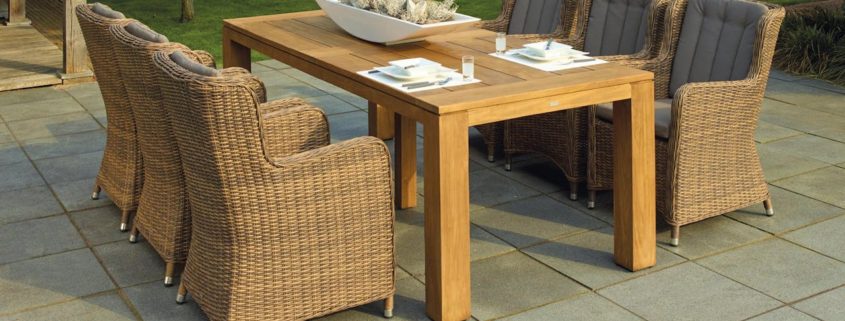 Sonoma Backyard outdoor display featuring elegant patio sets and fire pit – a trusted choice among patio furniture stores and the perfect option when searching for a patio furniture store near me.